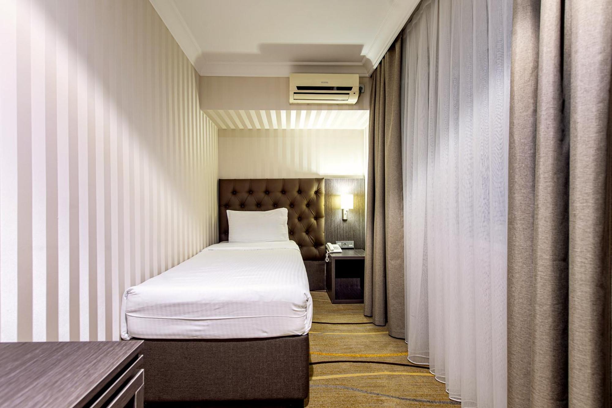 Shymkent Grand Hotel Extérieur photo