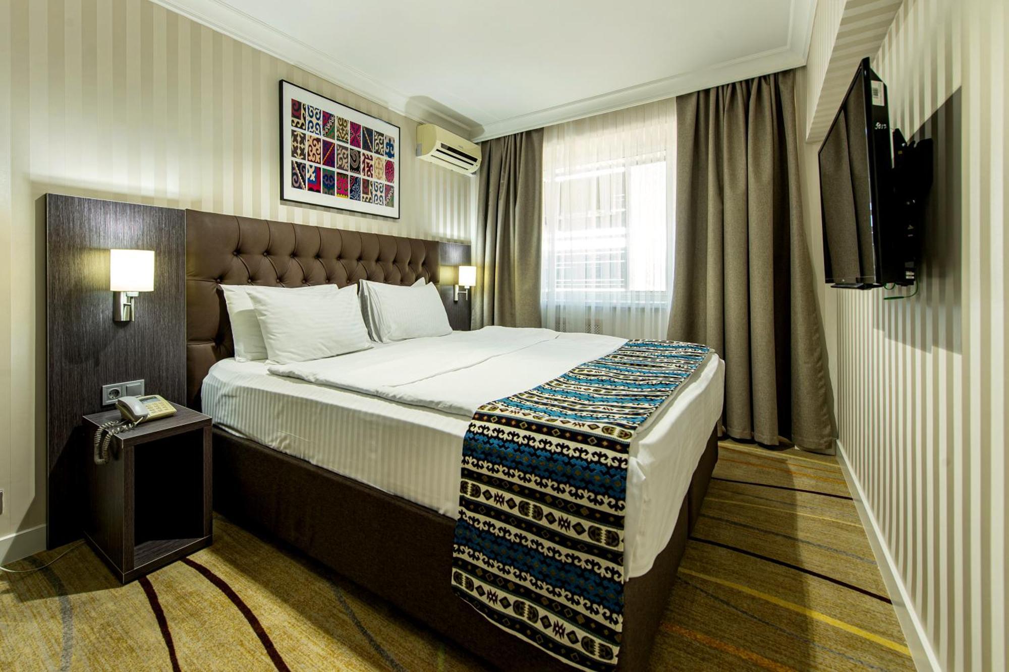 Shymkent Grand Hotel Extérieur photo